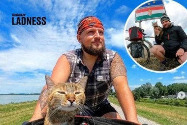 (FOTO) Biciklista našao zalutalu mačku pored puta, a onda su postali PAR KOJI OSVAJA SVET!